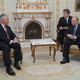 President-Elect and Russian Prime Minister Vladimir Putin (R) talks with Exxon Mobile CEO and Chairman Rex Tillerson (L) during their meeting in Moscow, Russia, 16 April 2012.